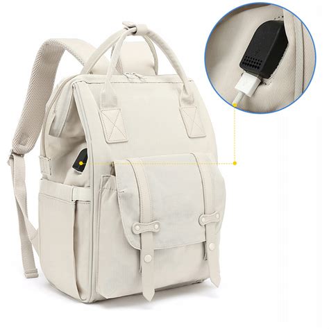 Štýlový batoh pripevnený na rukoväť kočíka