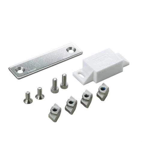 Detail zošívania dielov overalu